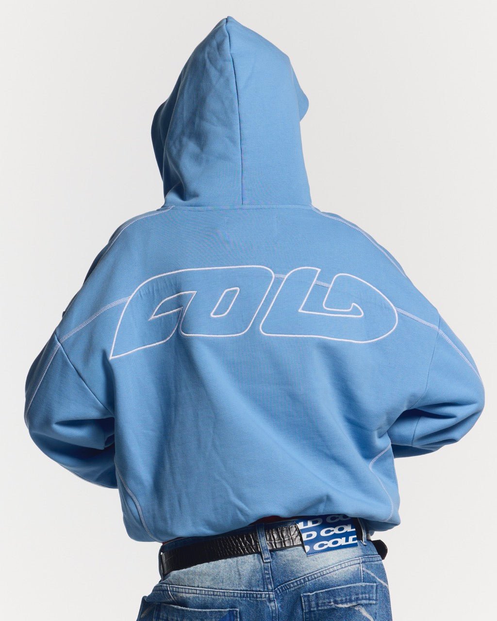 ROLLER HOODIE BLUE - blue oversized hoodie, back view on female model - Cold Culture #woman