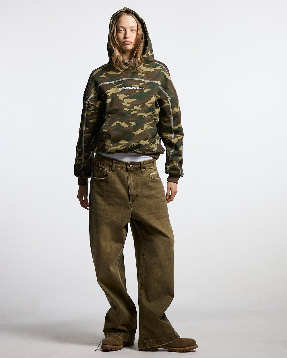 ROLLER HOODIE CAMO GREEN - green camo hoodie, front view on female model - Cold Culture #woman