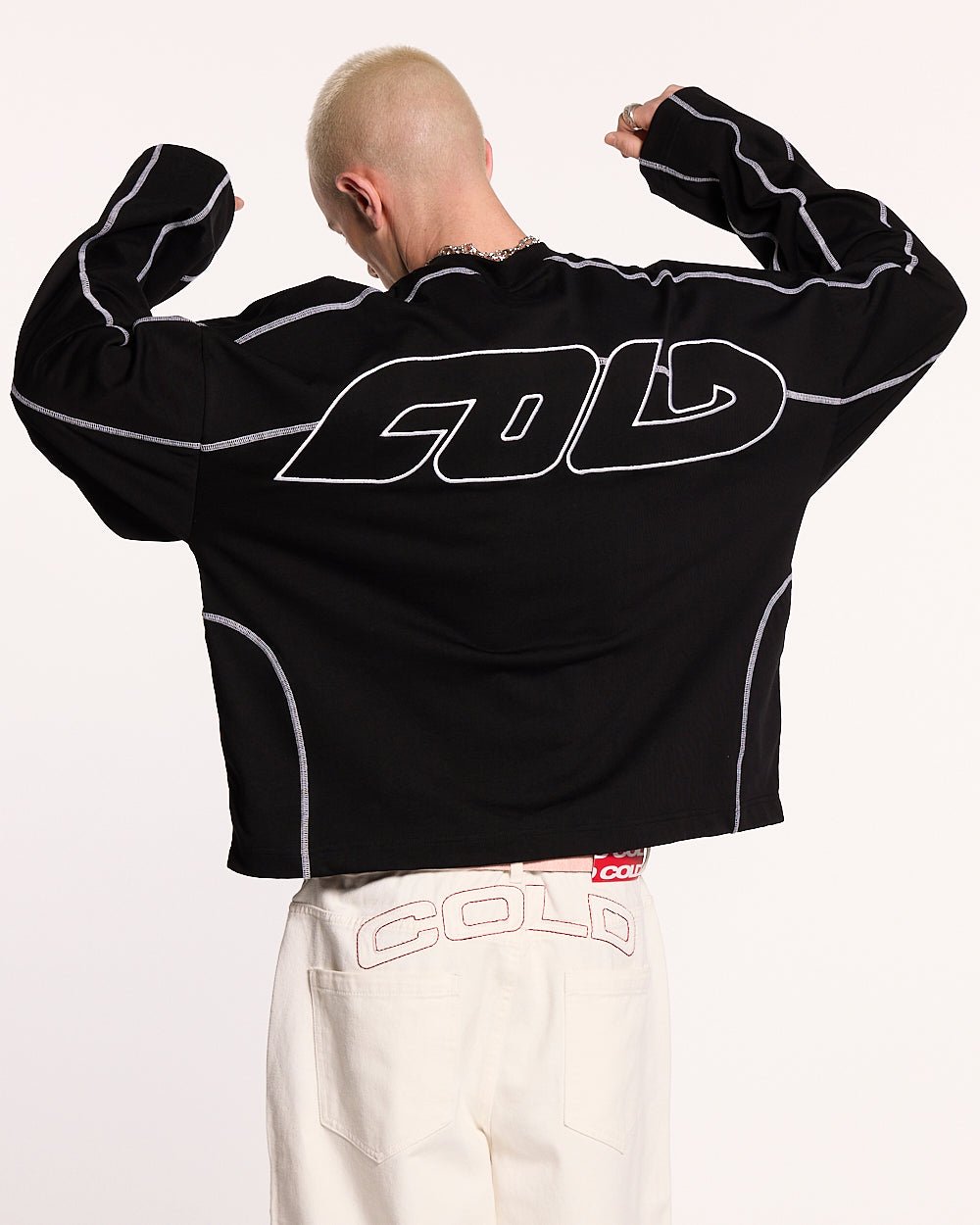 ROLLER LONGSLEEVE TEE BLACK - black oversized longsleeve tee, back view on male model - Cold Culture #man