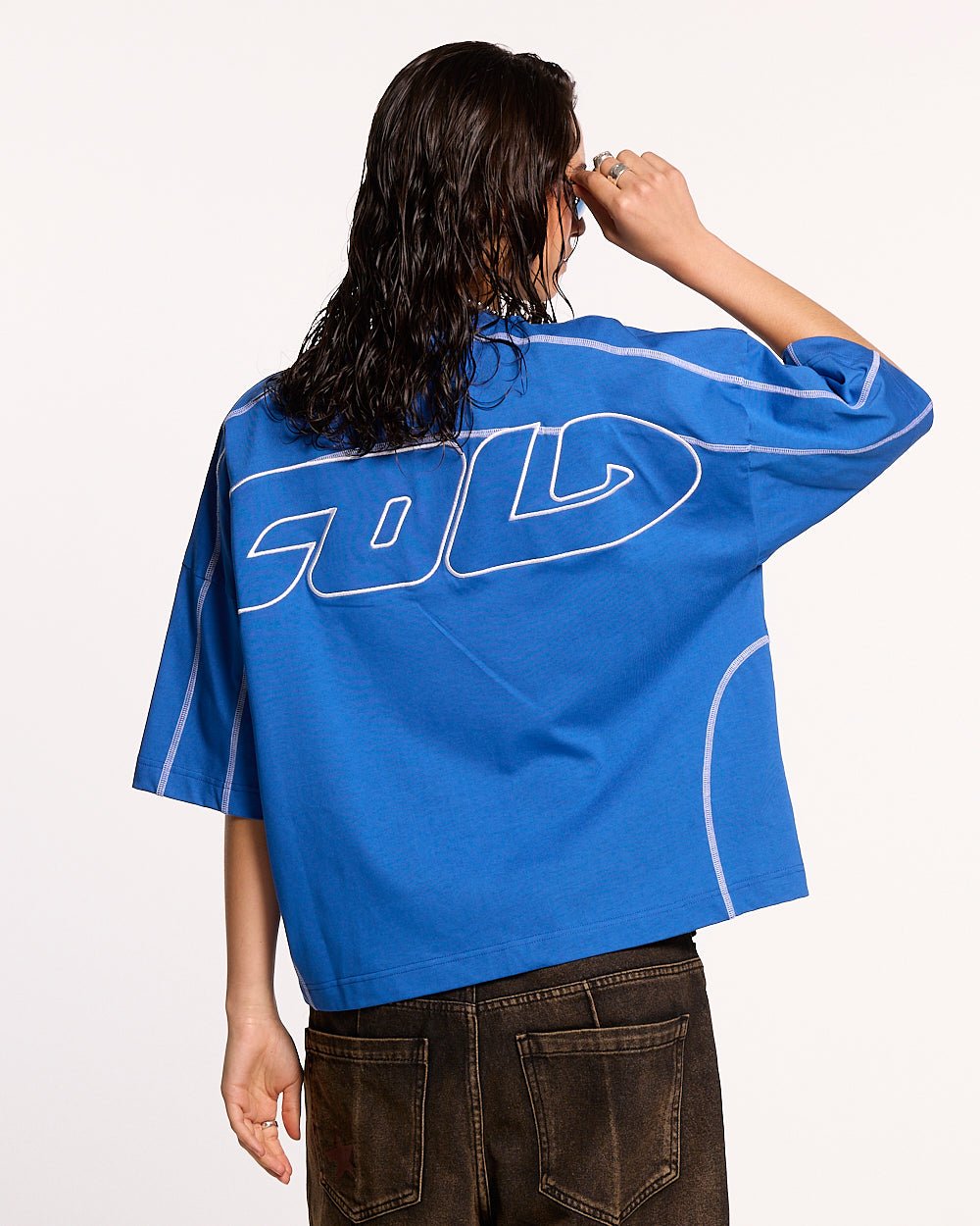 ROLLER TEE BLUE - blue oversized tee, back view on female model - Cold Culture #woman