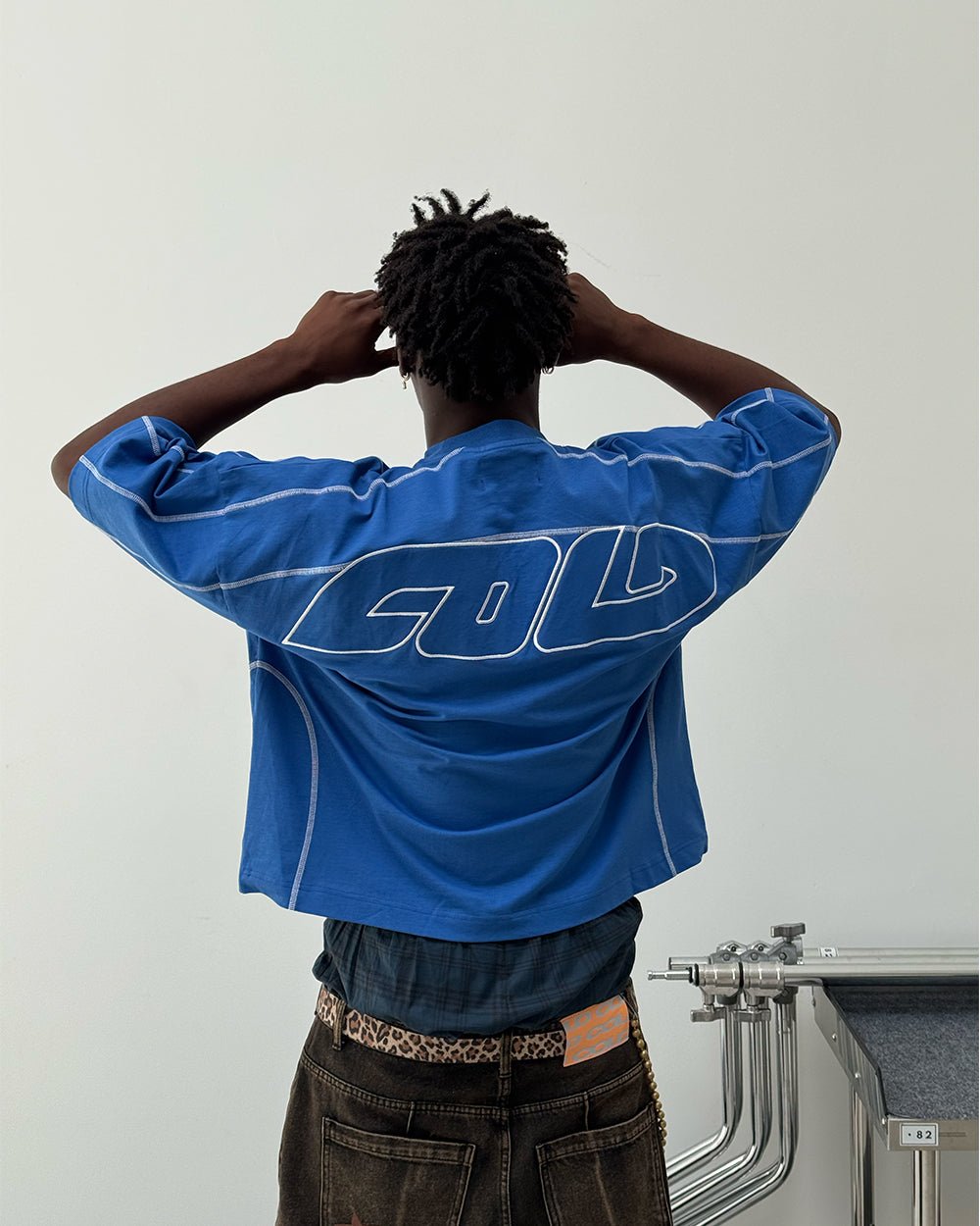 ROLLER TEE BLUE - blue oversized tee, back view on male model - Cold Culture #man