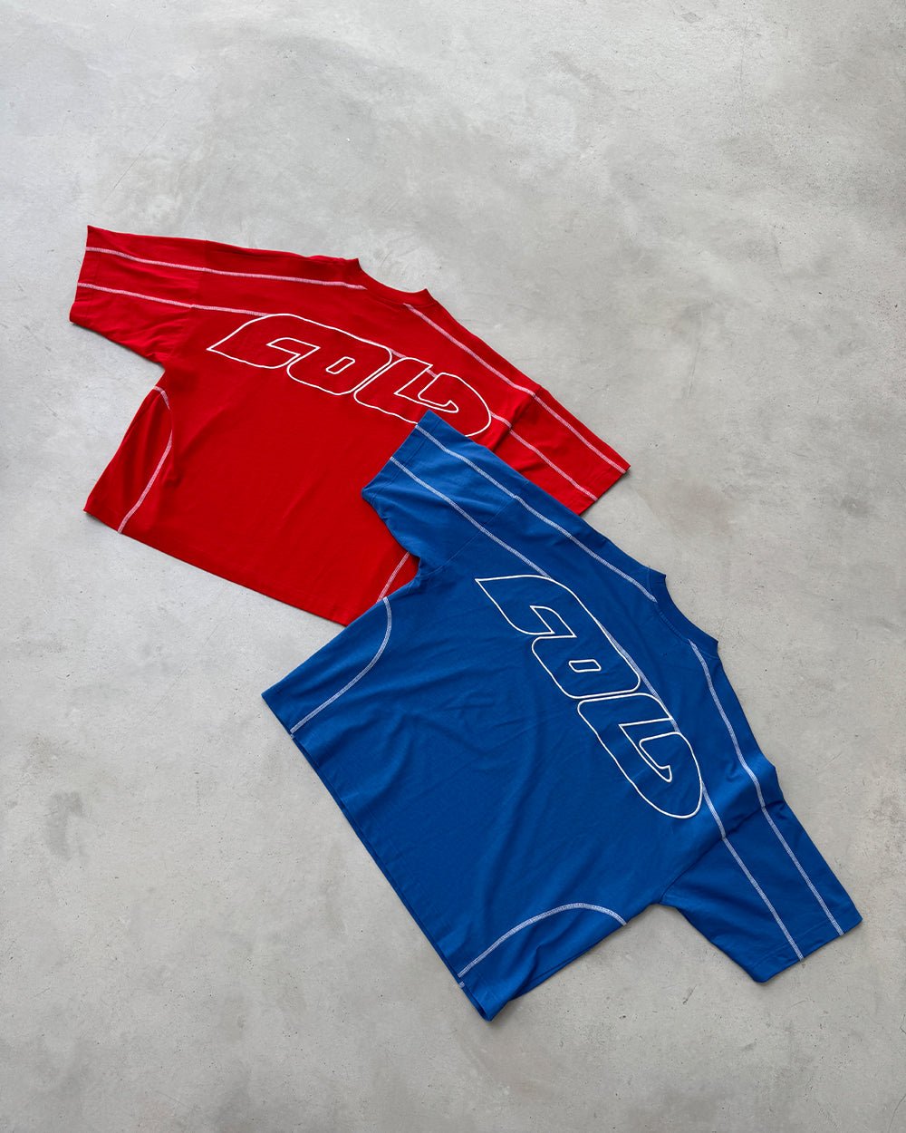 ROLLER TEE BLUE - blue oversized tee, flat lay with matching pieces - Cold Culture