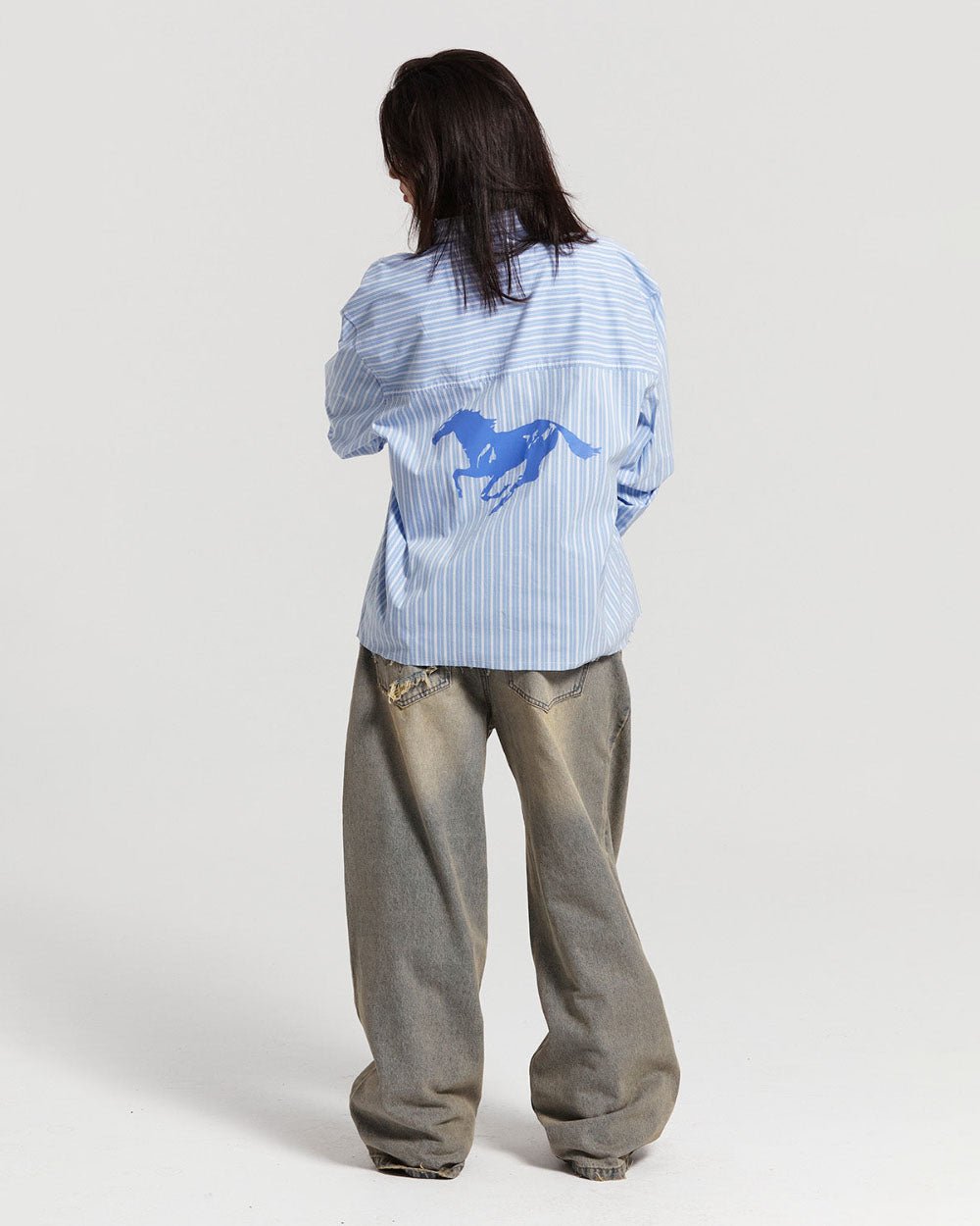 RUNNING HORSE SHIRT BLUE STRIPES - blue striped long sleeve shirt, back view on female model - Cold Culture #woman