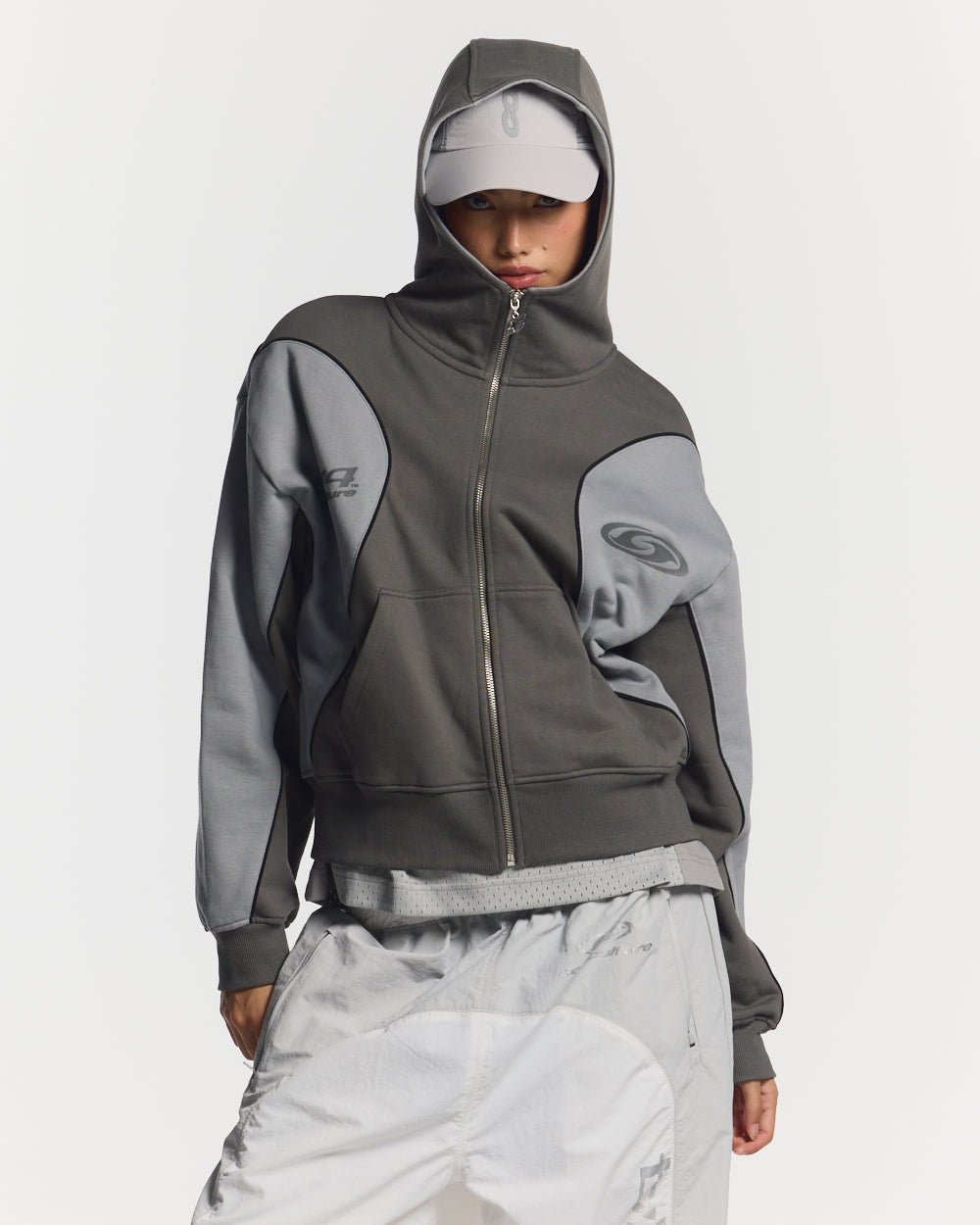 RUSH ZIPPER HOODIE GREY - grey two-tone zip-up hoodie, front view on female model - Cold Culture #woman