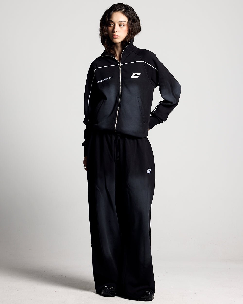 SAVAGE WASHED PANTS BLACK & WHITE - black and white washed sweatpants, front view on female model - Cold Culture #woman
