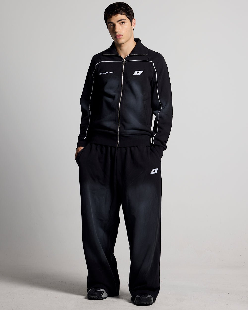 SAVAGE WASHED PANTS BLACK & WHITE - black and white washed sweatpants, front view on male model - Cold Culture #man