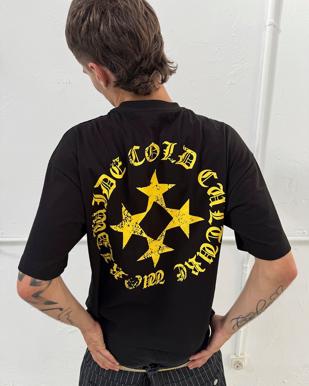 SCATTER TEE BLACK - black graphic print tee, back view on male model - Cold Culture #man