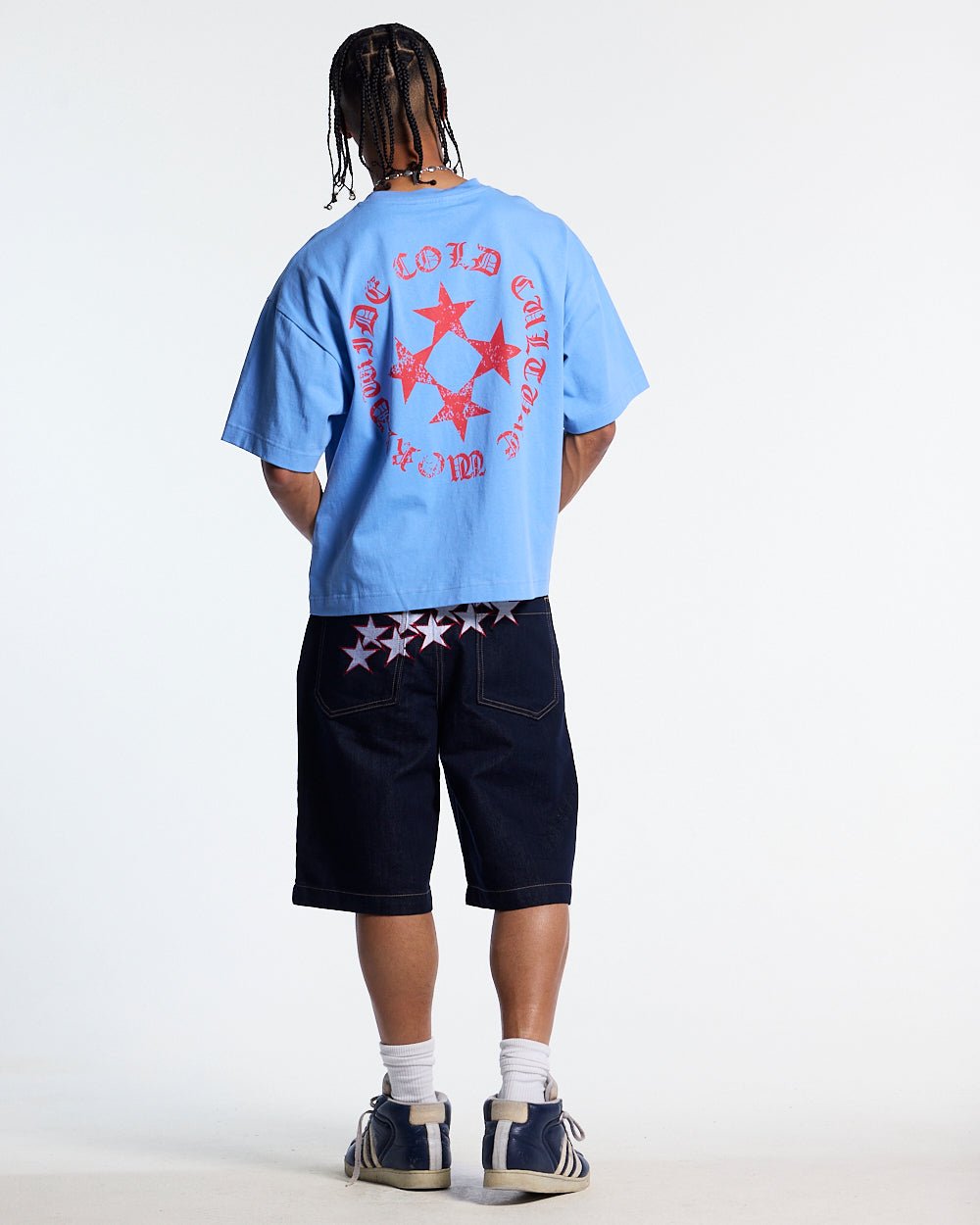 SCATTER TEE BLUE - blue graphic print tee, back view on male model - Cold Culture #man