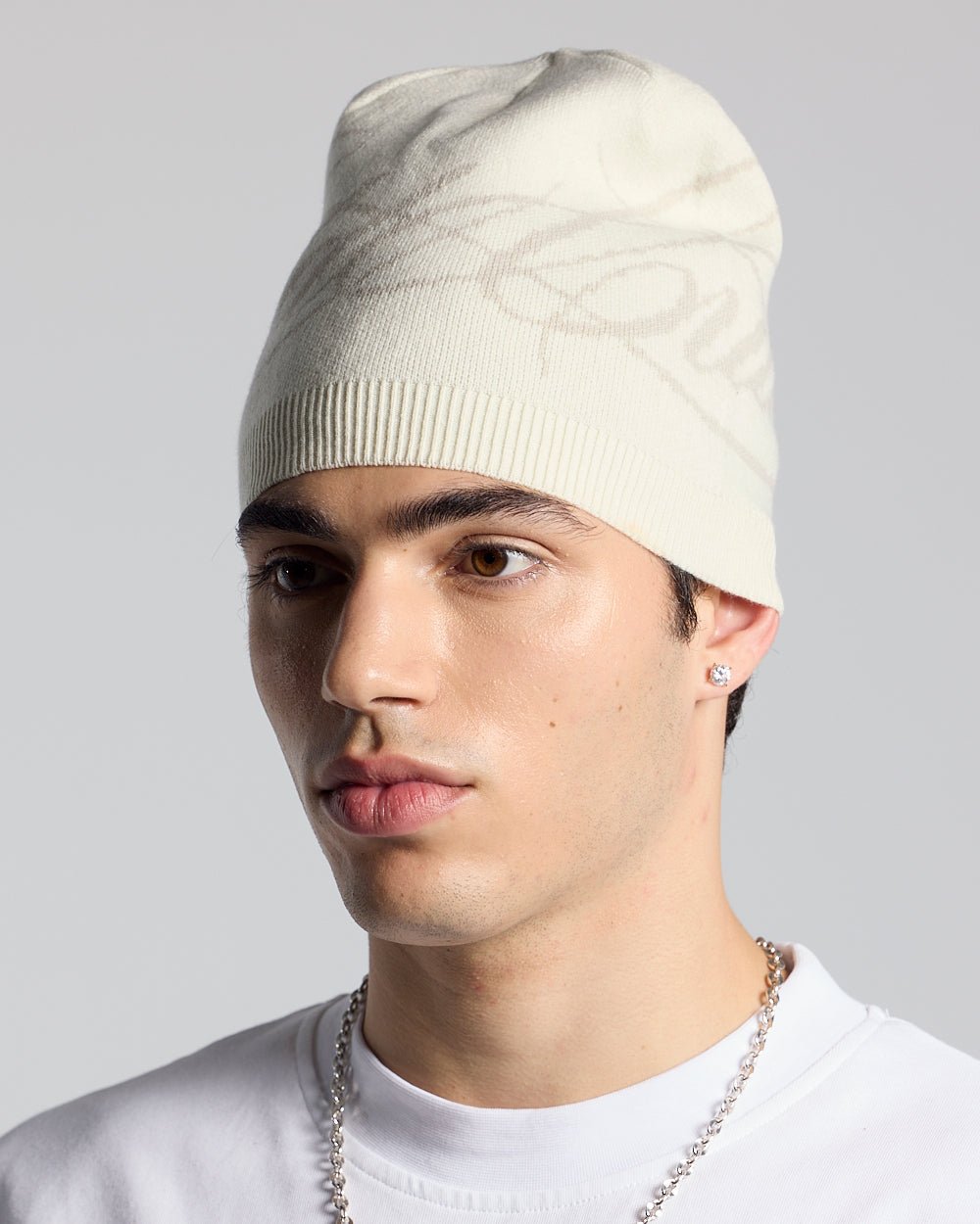 SCRIPT BEANIE GREY - light grey script knit beanie, on model close-up - Cold Culture #man