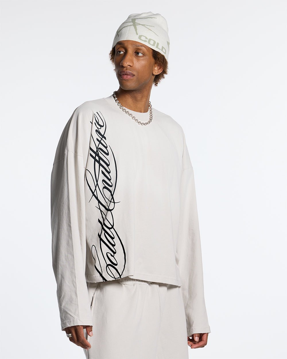 SCRIPT LONGSLEEVE TEE LIGHT GREY - light grey script print longsleeve tee, front view on male model - Cold Culture #man