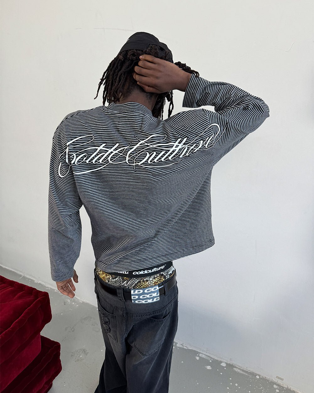 SCRIPT STRIPES LONGSLEEVE BLACK - black striped longsleeve tee, back view on male model - Cold Culture #man