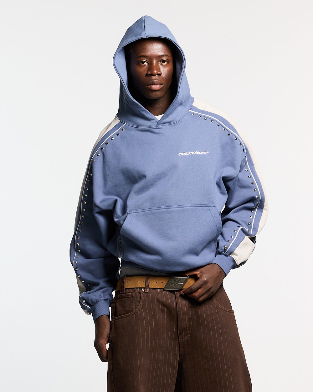 SCRIPT STUDS HOODIE BLUE - blue studded hoodie, front view on male model - Cold Culture #man