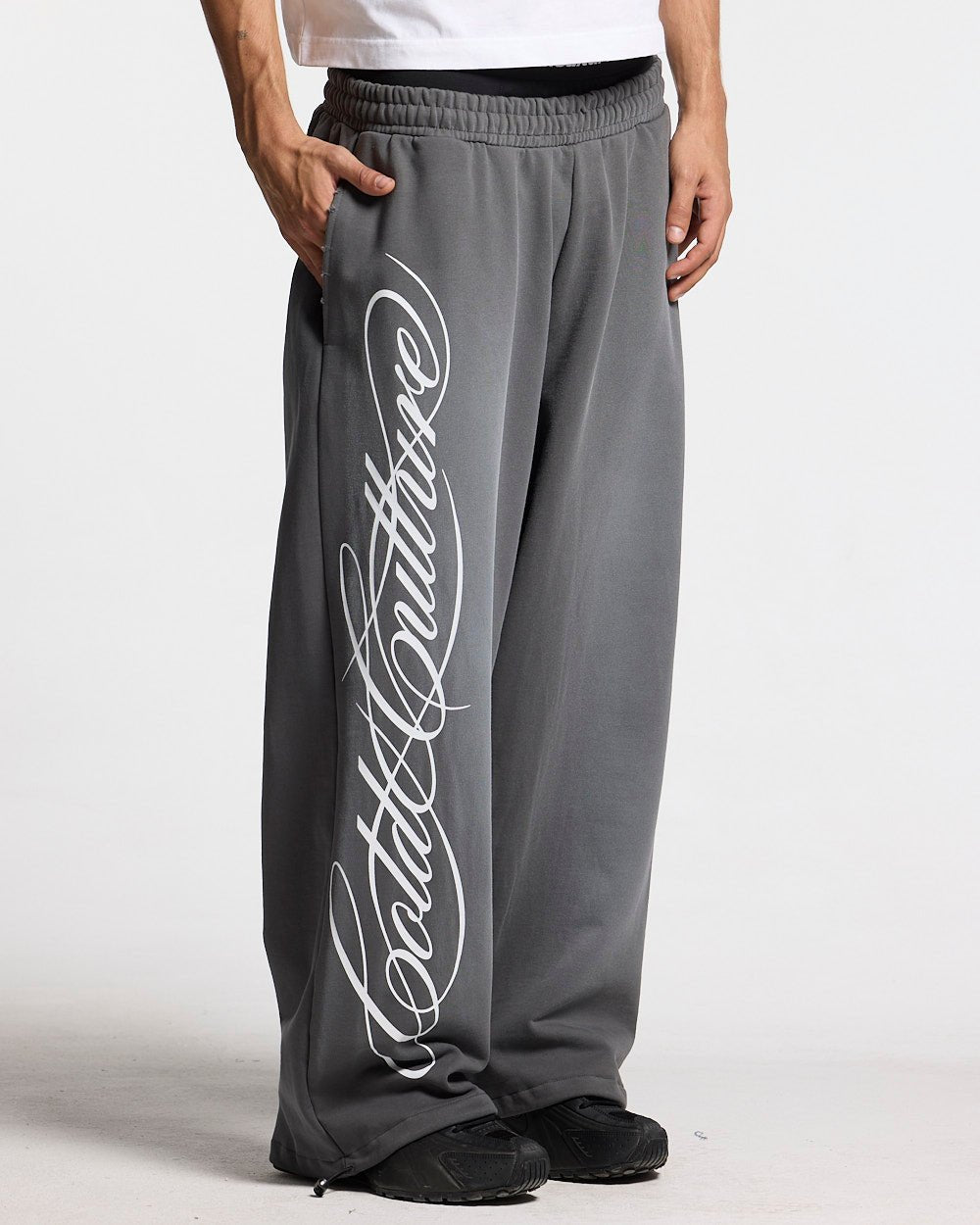 SCRIPT SWEATPANTS ANTRACITE GREY - dark grey script print sweatpants, front view on male model - Cold Culture