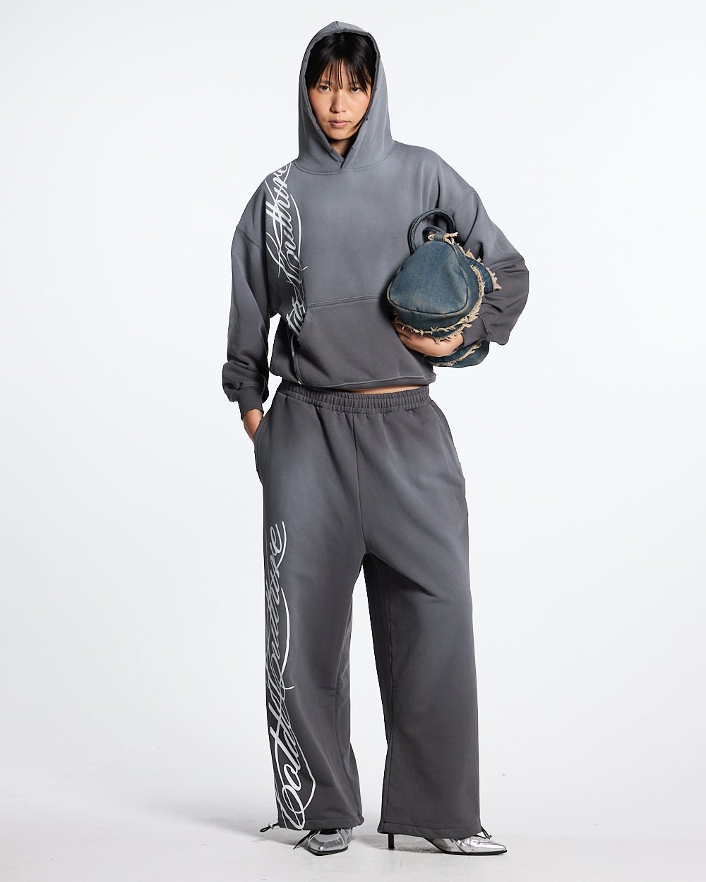 SCRIPT SWEATPANTS ANTRACITE GREY - dark grey script print sweatpants, front view on female model - Cold Culture #woman