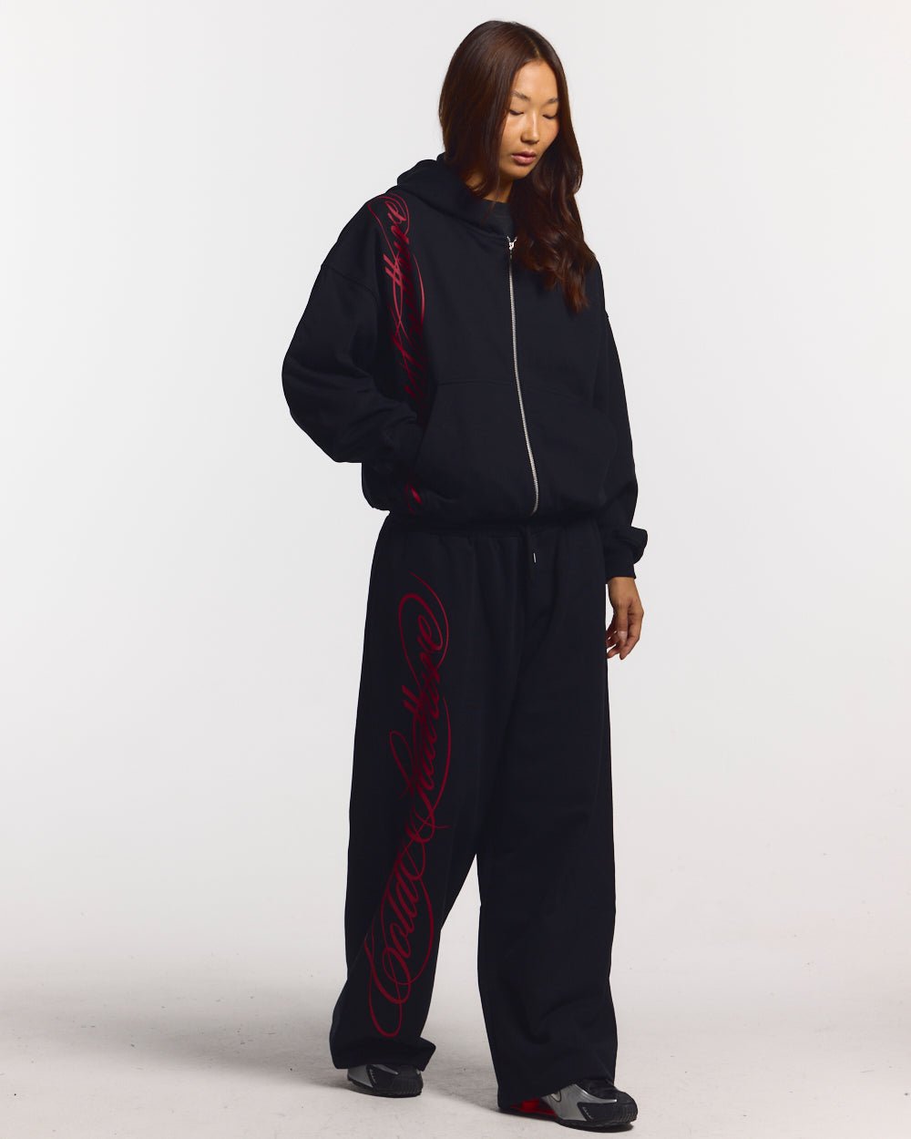 SCRIPT SWEATPANTS BLACK - black graphic print sweatpants, front view on female model - Cold Culture #woman
