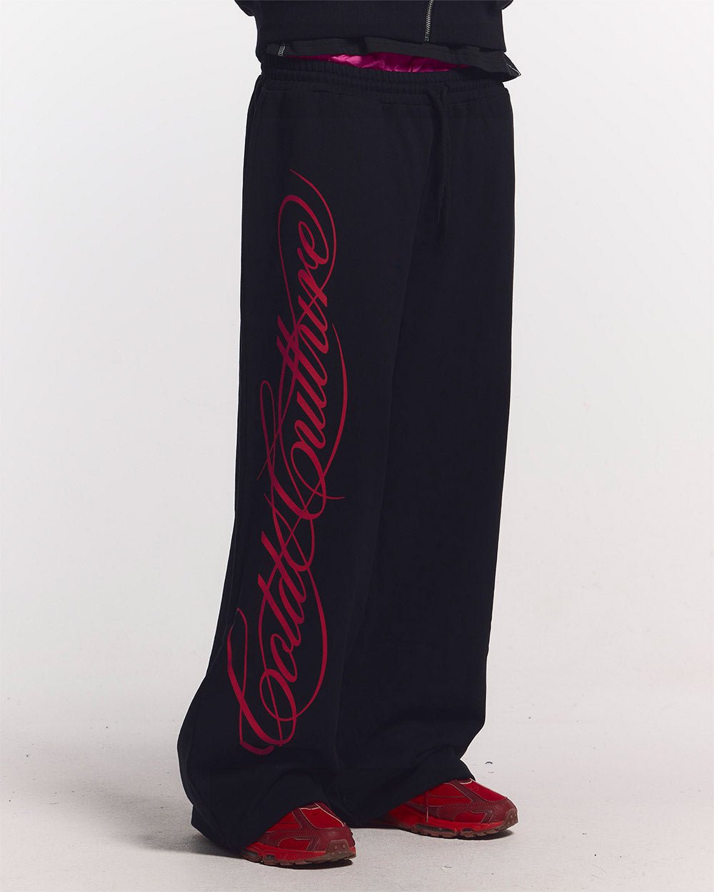 SCRIPT SWEATPANTS BLACK - black graphic print sweatpants, front view on male model - Cold Culture