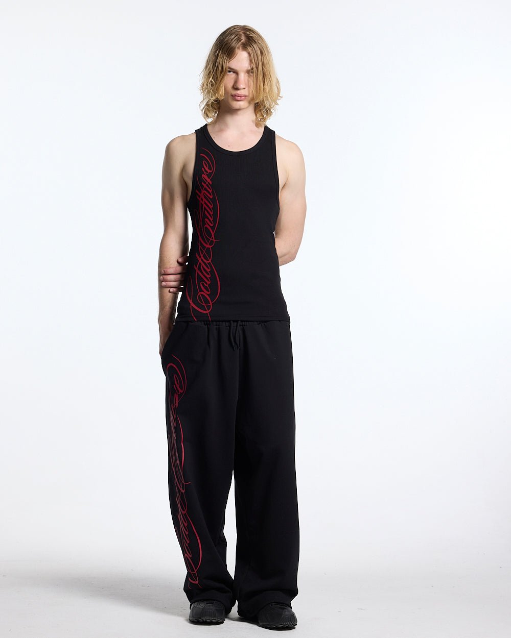 SCRIPT TANK TOP BLACK - black ribbed tank top, front view on male model - Cold Culture #man