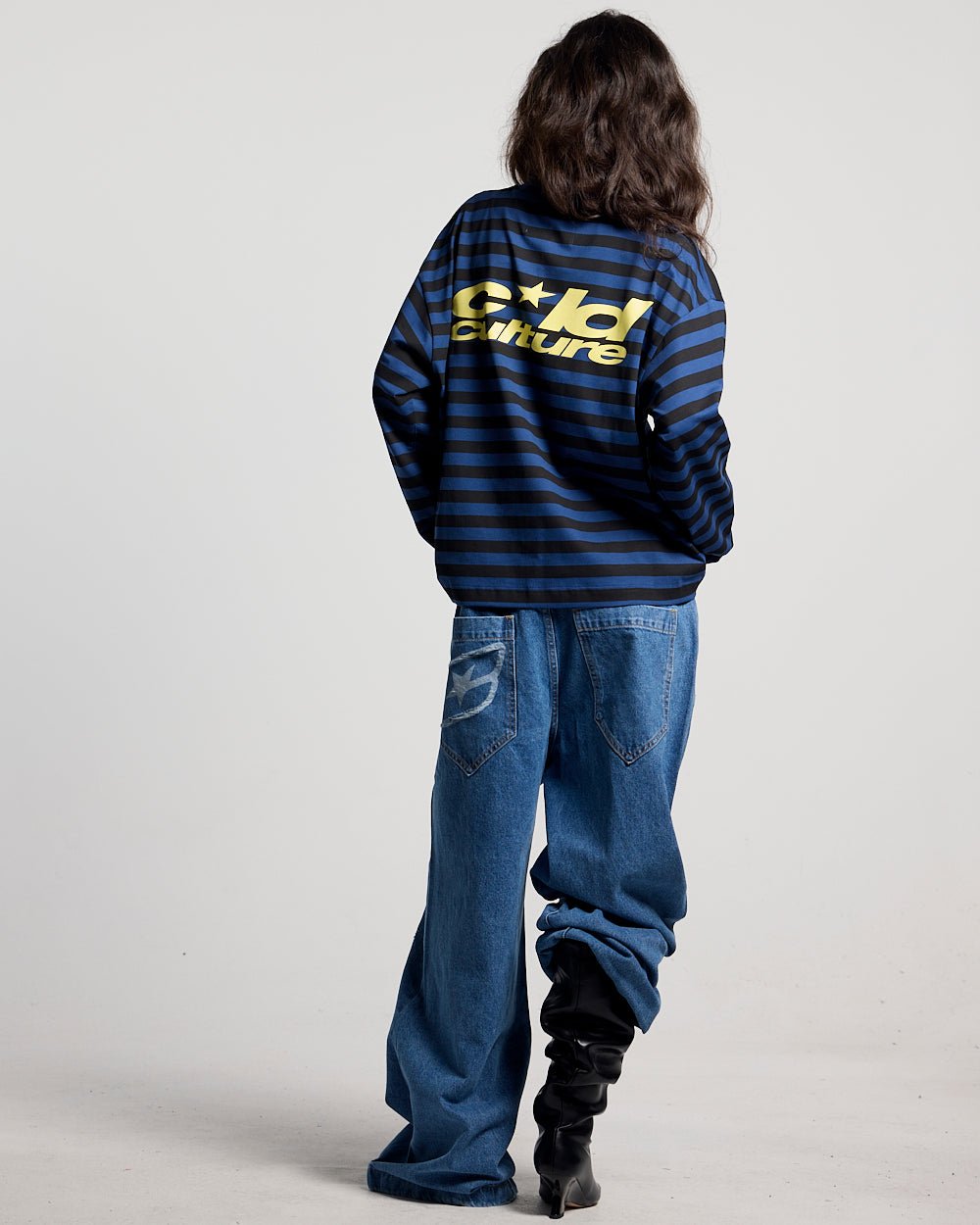 SCRIPT V3 PANTS LIGHT BLUE - light blue distressed denim pants, back view on female model - Cold Culture #woman
