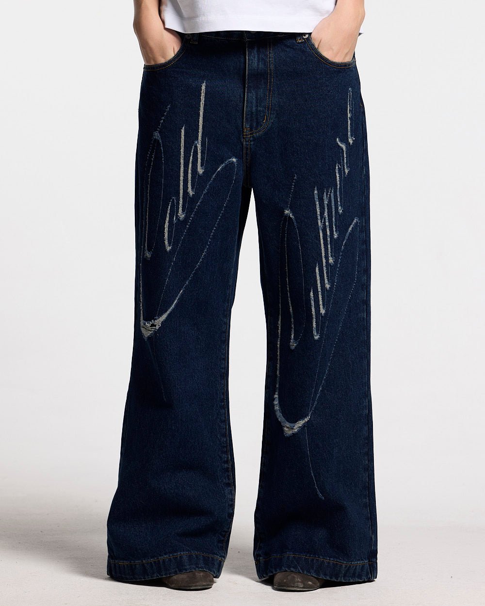 SCRIPT V3 PANTS RAW DENIM - dark blue baggy denim pants, front view on female model - Cold Culture #woman