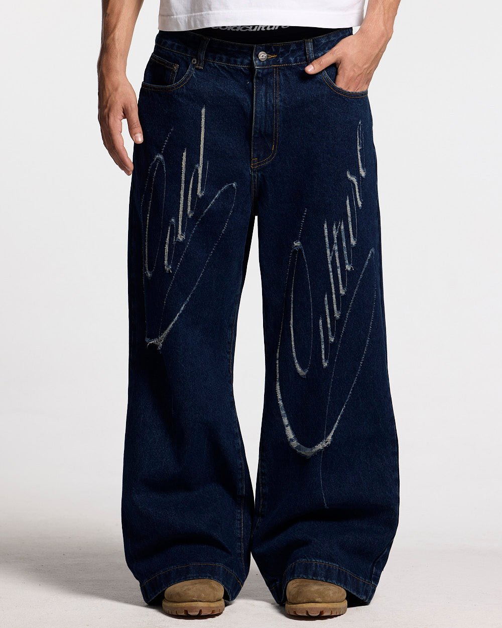 SCRIPT V3 PANTS RAW DENIM - dark blue baggy denim pants, front view on male model - Cold Culture