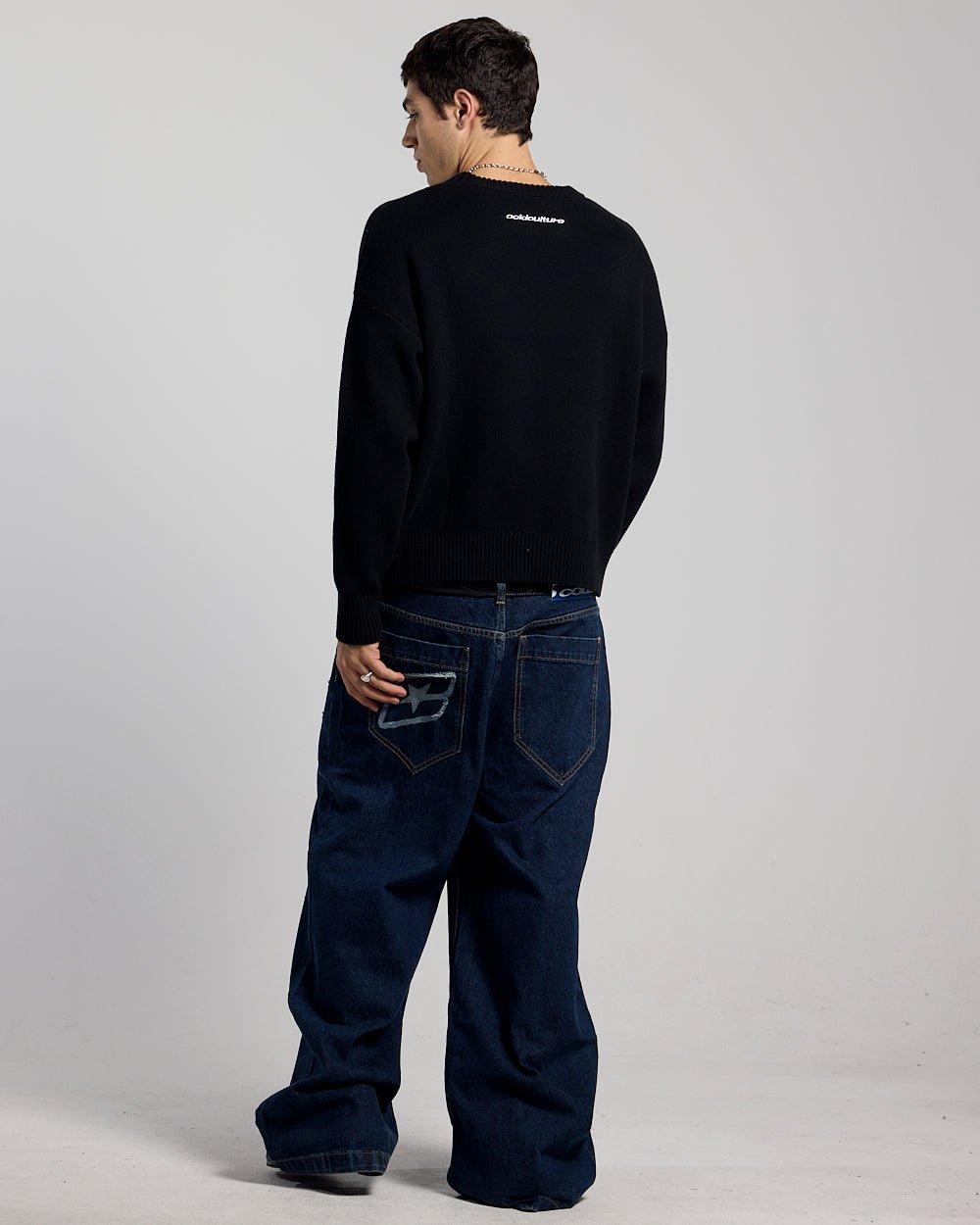 SCRIPT V3 PANTS RAW DENIM - dark blue baggy denim pants, back view on male model - Cold Culture #man