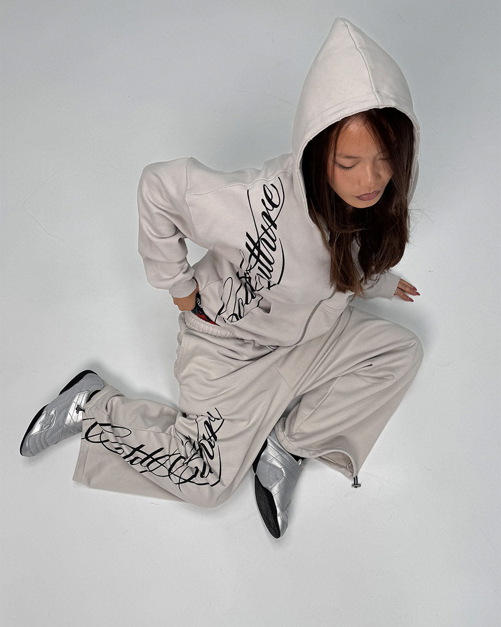 SCRIPT ZIP HOODIE LIGHT GREY - light grey script print zip hoodie, street style shot - Cold Culture #woman