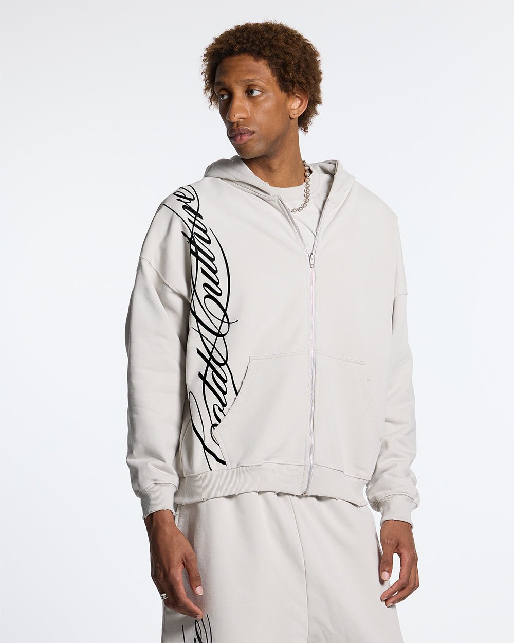SCRIPT ZIP HOODIE LIGHT GREY - light grey script print zip hoodie, front view on male model - Cold Culture #man