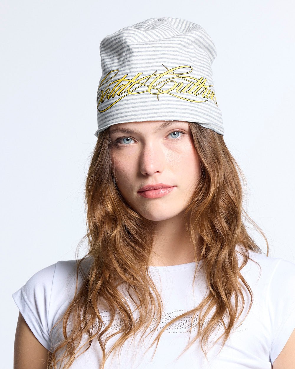 SCRIPTED STRIPES BEANIE WHITE - white striped beanie, front view on female model - Cold Culture #woman