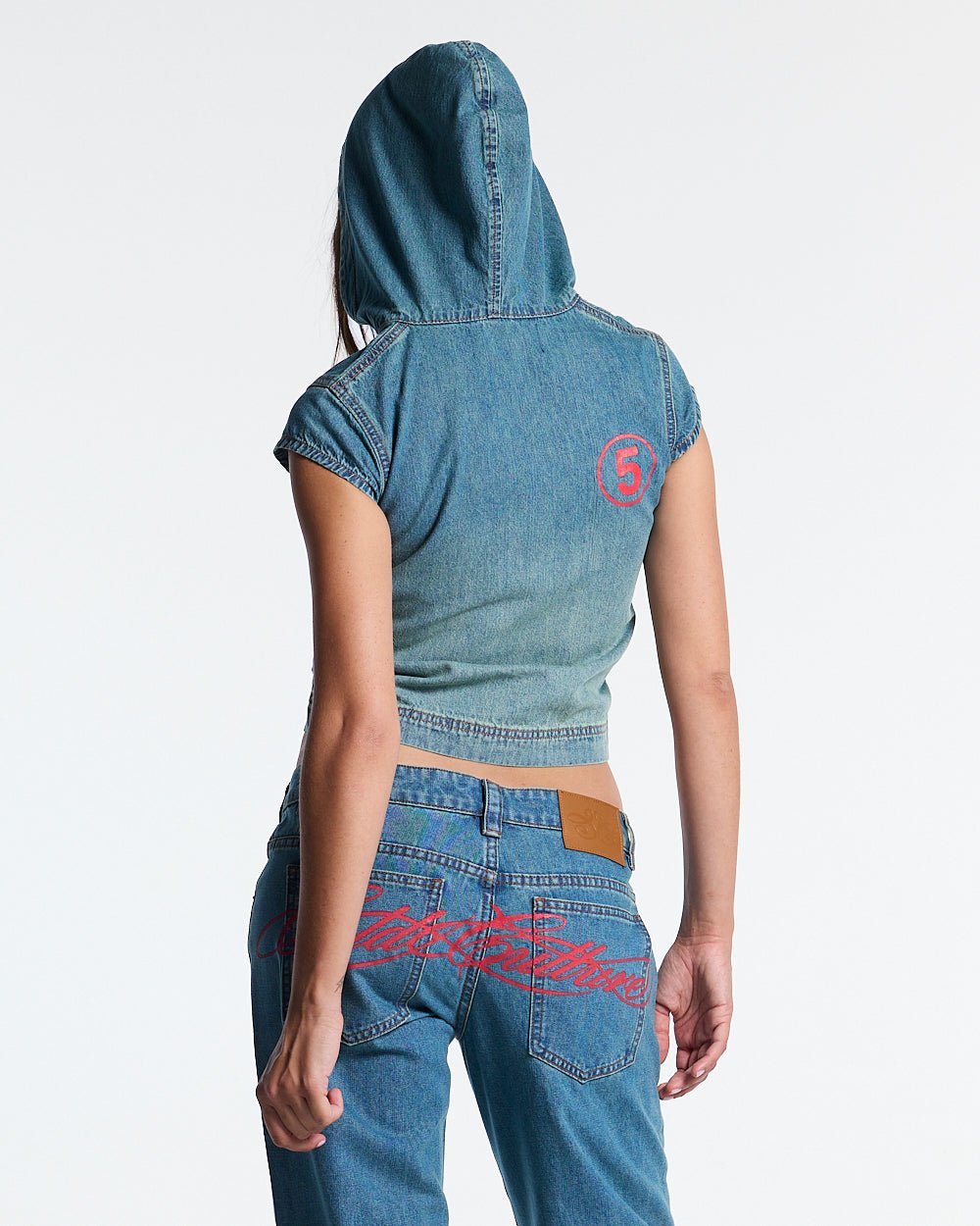 SIGHT ZIP BABY TEE DENIM - washed denim zip tee, back view on female model - Cold Culture #woman