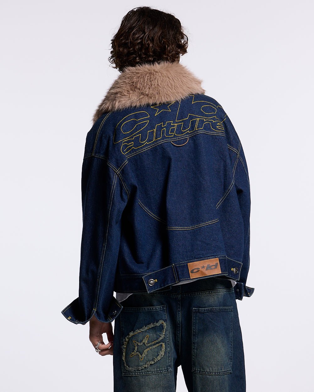 SOFT FUR DENIM JACKET RAW DENIM - dark denim jacket with fur collar, back view on male model - Cold Culture #man