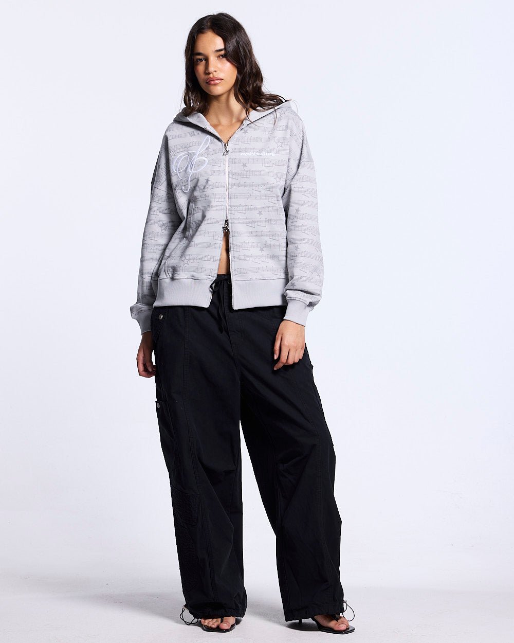 SOLID CARGO PANTS BLACK - black cargo pants, front view on female model - Cold Culture #woman