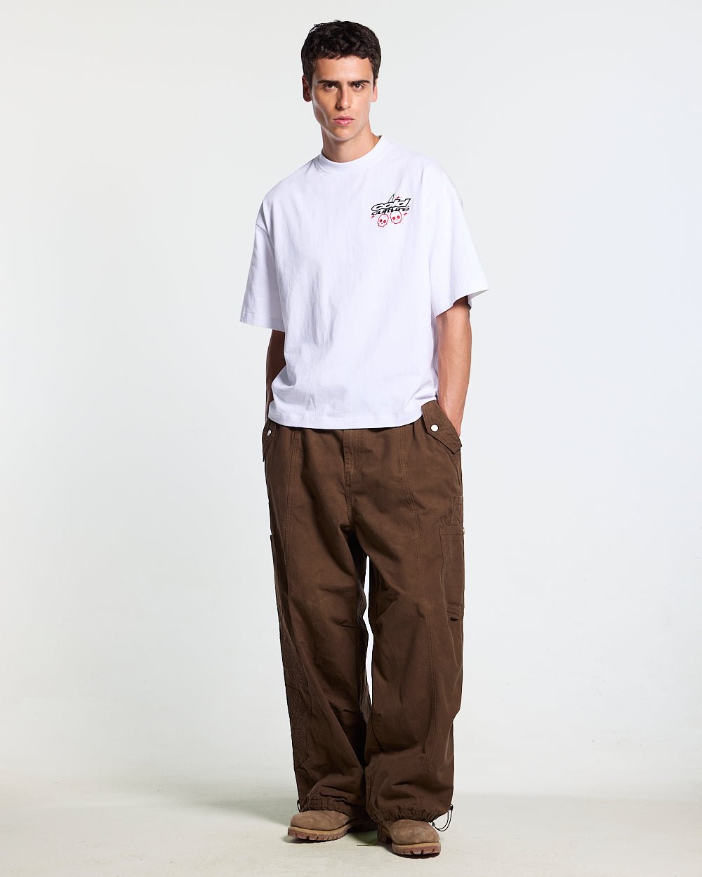 SOLID CARGO PANTS BROWN - brown cargo pants, front view on male model - Cold Culture #man