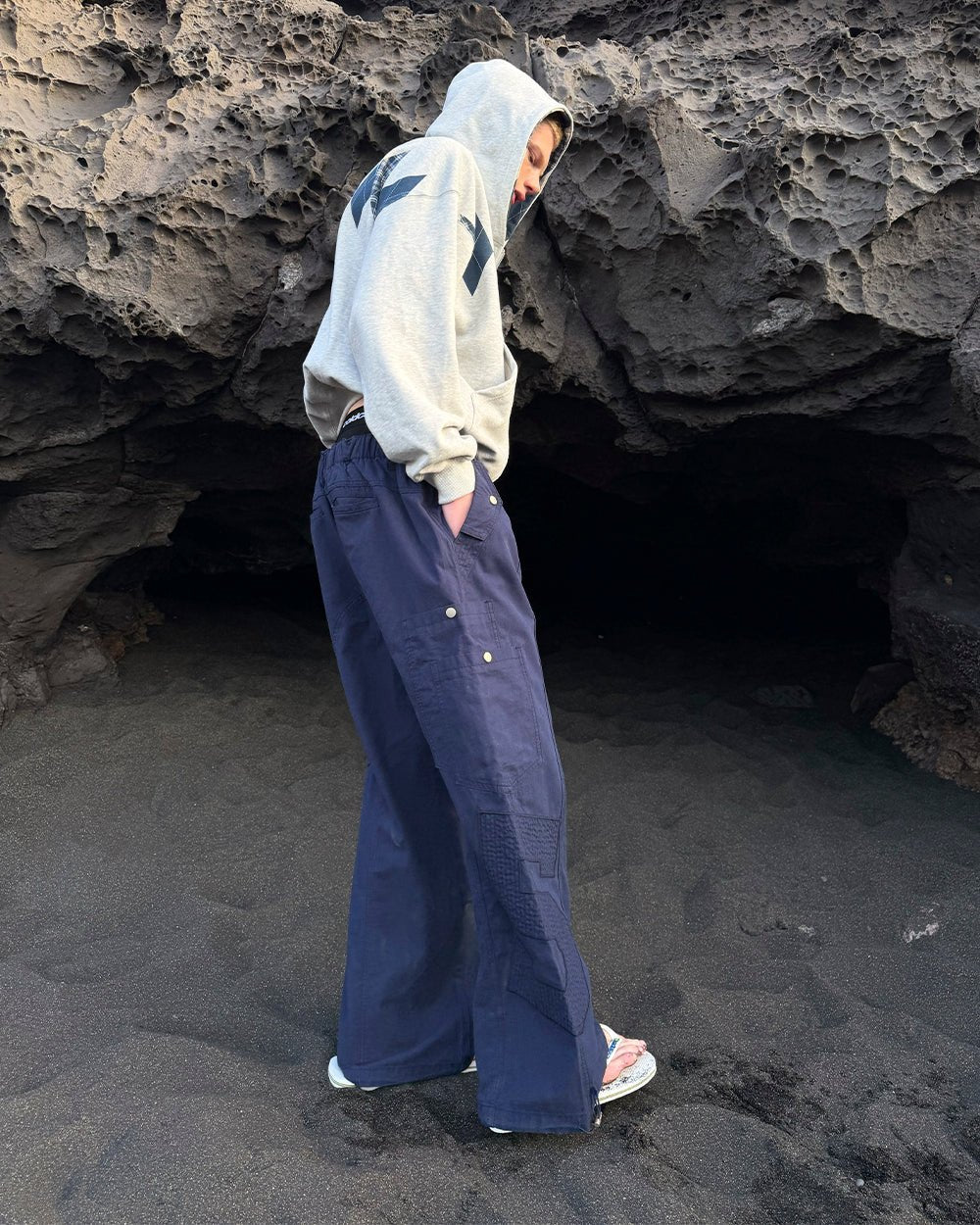 SOLID CARGO PANTS NAVY - navy cargo pants, street style shot - Cold Culture