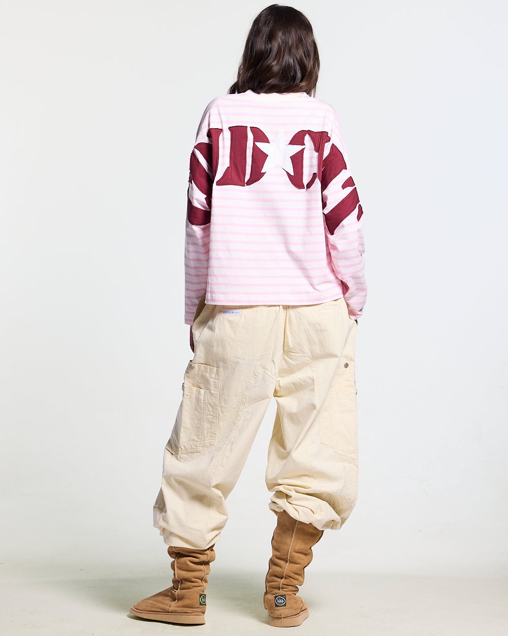 SOLID CARGO PANTS WHITE - off-white cargo pants, back view on female model - Cold Culture #woman