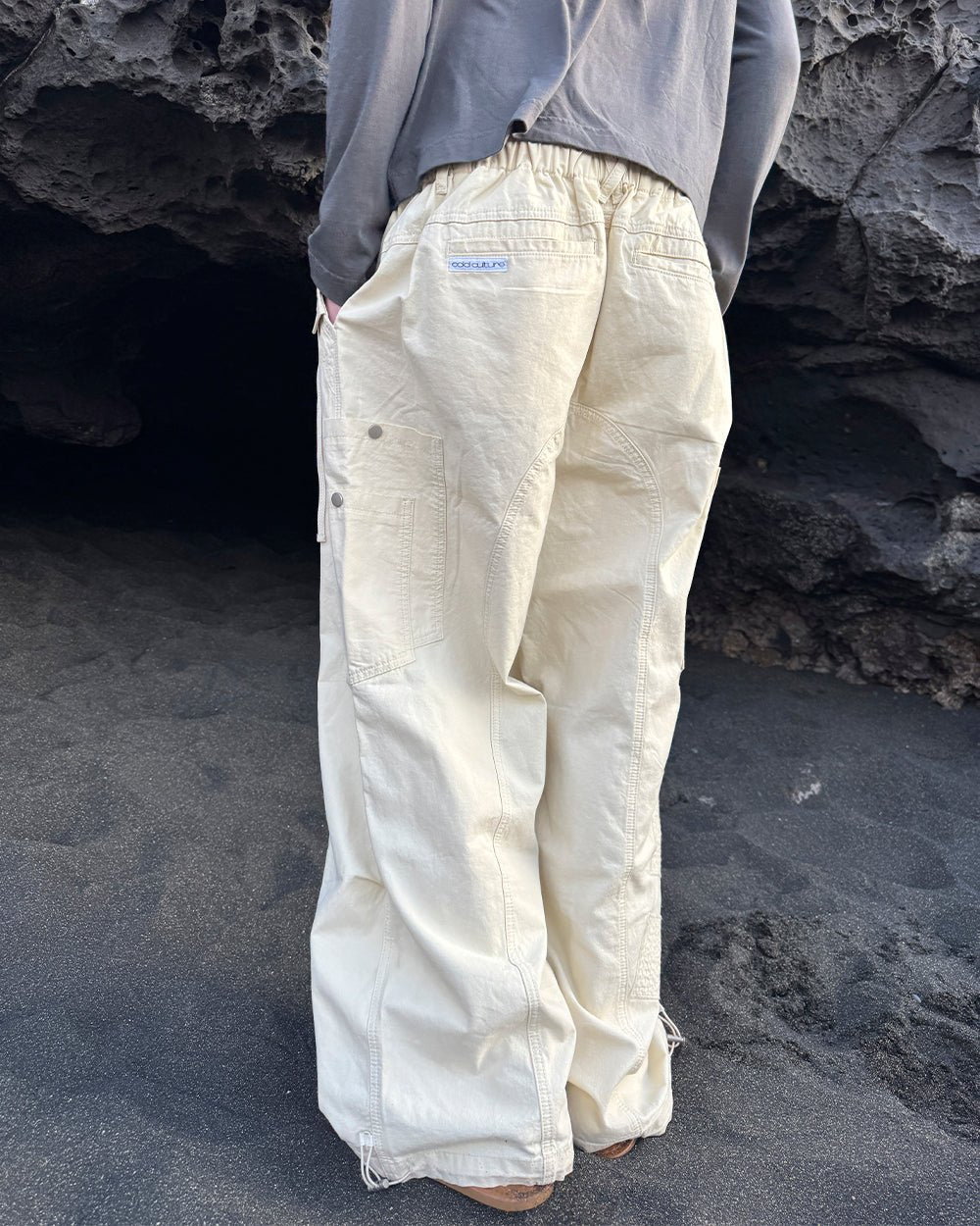 SOLID CARGO PANTS WHITE - off-white cargo pants, street style shot - Cold Culture