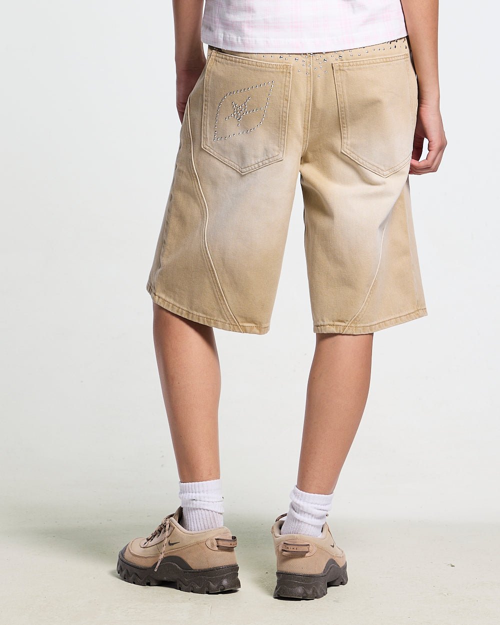 SPARK SHORTS BEIGE - beige washed denim shorts, back view on female model - Cold Culture #woman
