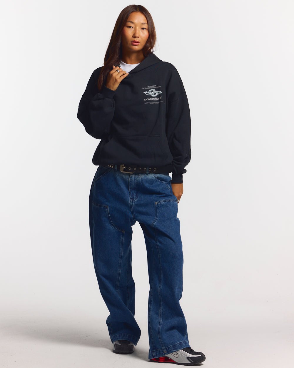 SPARKLY HOODIE BLACK - black graphic print hoodie, front view on female model - Cold Culture #woman
