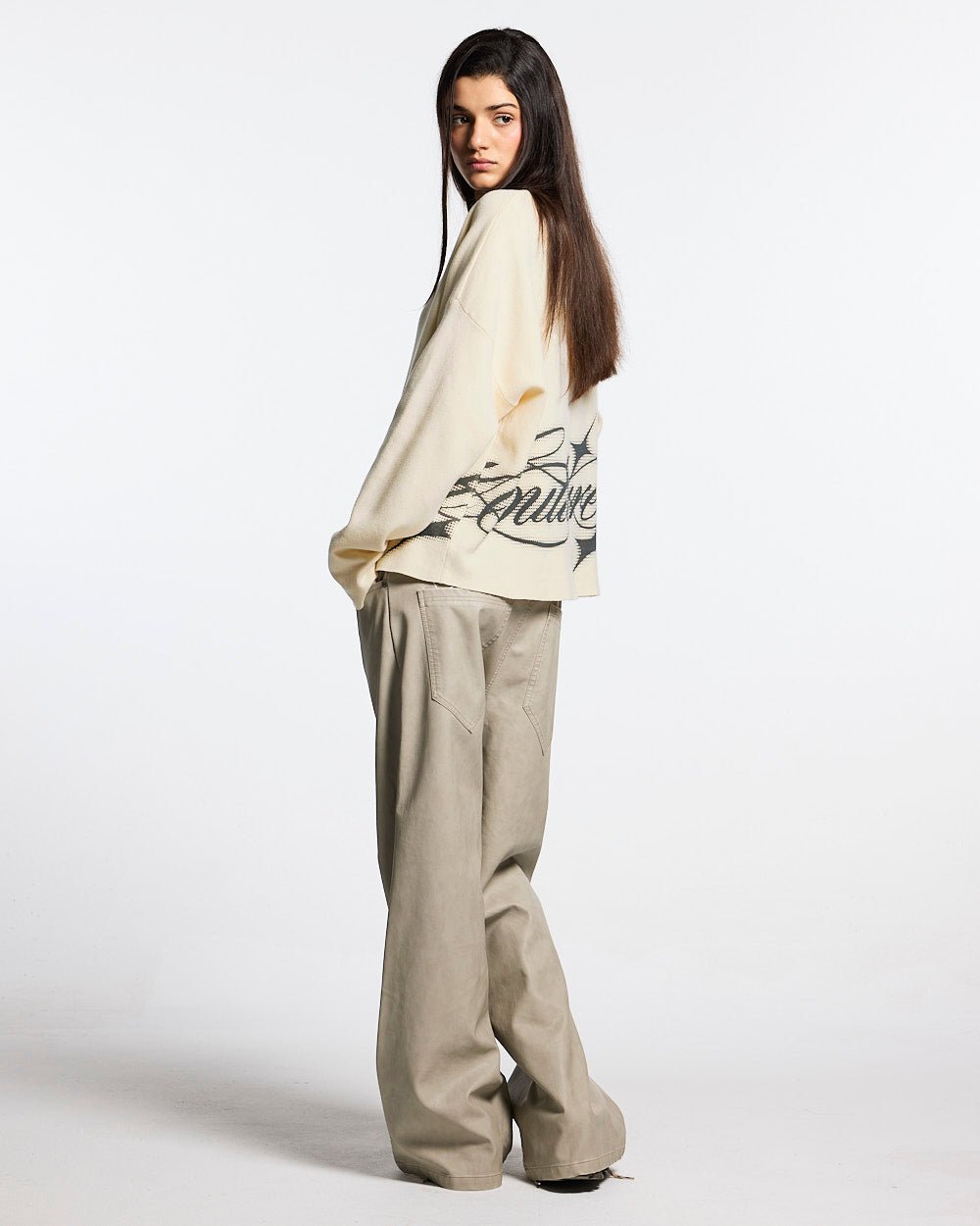 SPARKLY SCRIPT KNIT OFF WHITE - off white script knit sweater, back view on female model - Cold Culture #woman