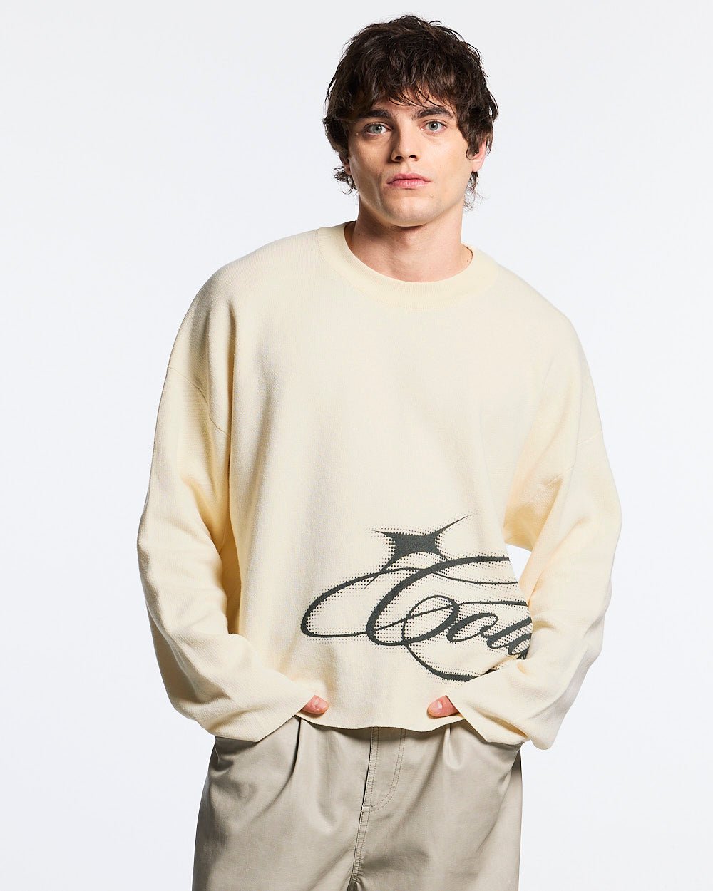 SPARKLY SCRIPT KNIT OFF WHITE - off white script knit sweater, front view on male model - Cold Culture #man