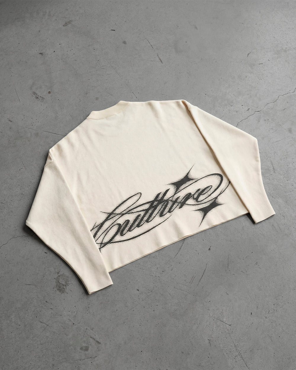 SPARKLY SCRIPT KNIT OFF WHITE - off white script knit sweater, flat lay - Cold Culture