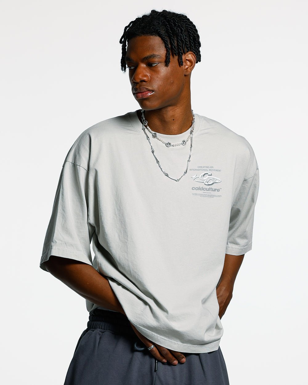 SPARKLY TEE LIGHT GREY - light grey graphic print tee, front view on male model - Cold Culture #man