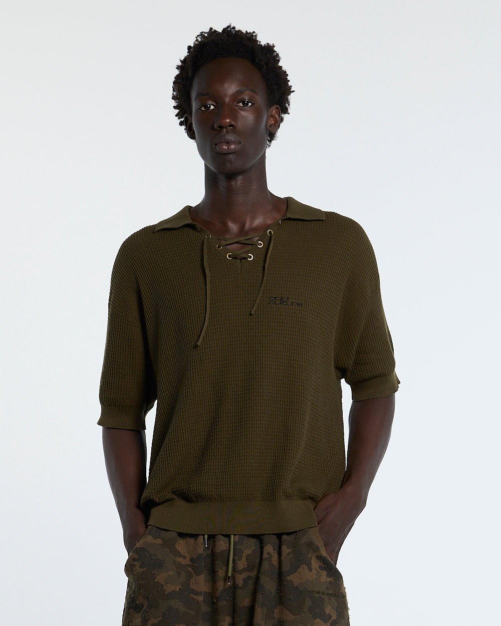 SPARROW KNIT POLO GREEN - olive green knit polo shirt, front view on male model - Cold Culture #man