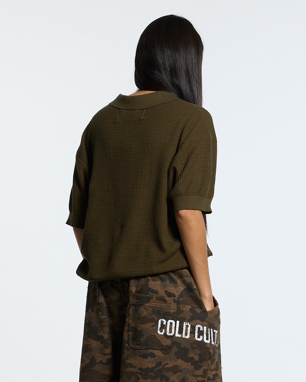 SPARROW KNIT POLO GREEN - olive green knit polo shirt, back view on female model - Cold Culture #woman
