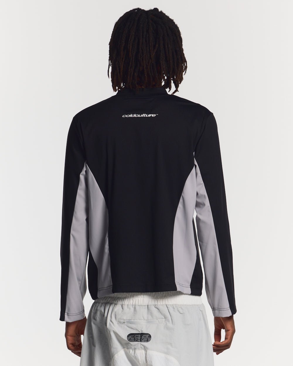 SPEED LONGSLEEVE BLACK - black two-tone longsleeve tee, back view on male model - Cold Culture #man