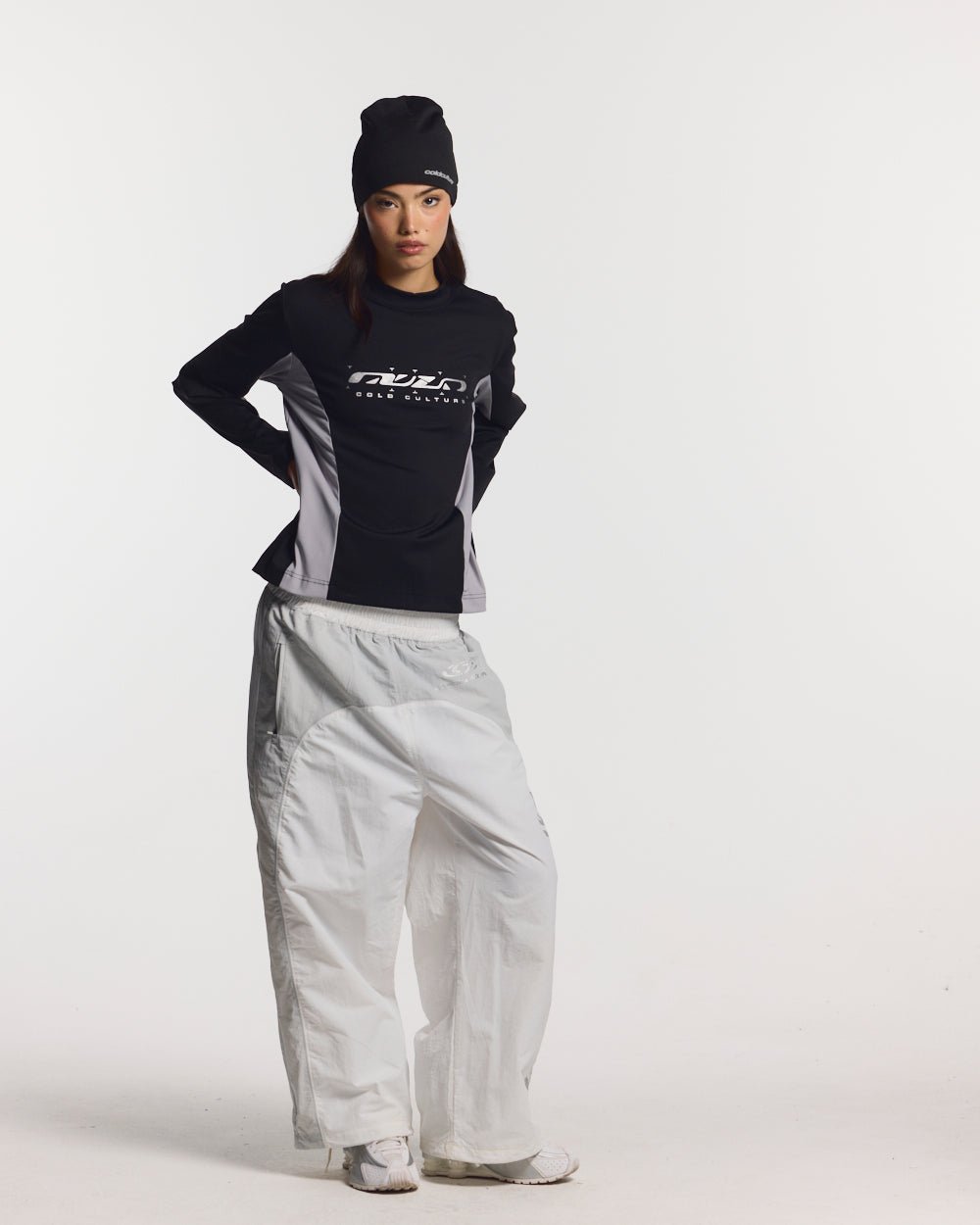 SPEED LONGSLEEVE BLACK - black two-tone longsleeve tee, front view on female model - Cold Culture #woman