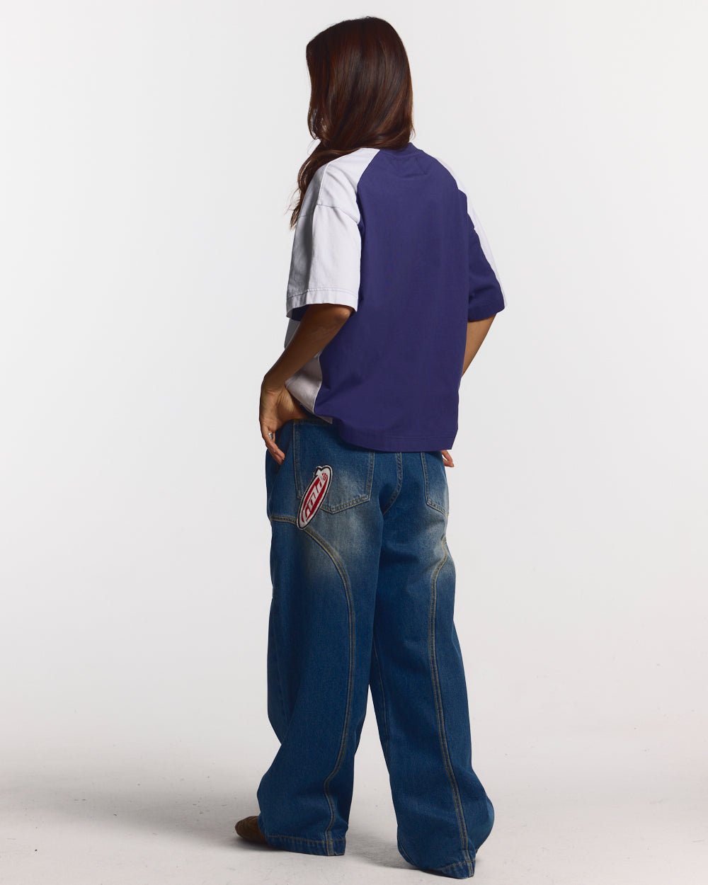 SPEED SPOKE TEE BLUE - navy and white panelled tee, back view on female model - Cold Culture #woman