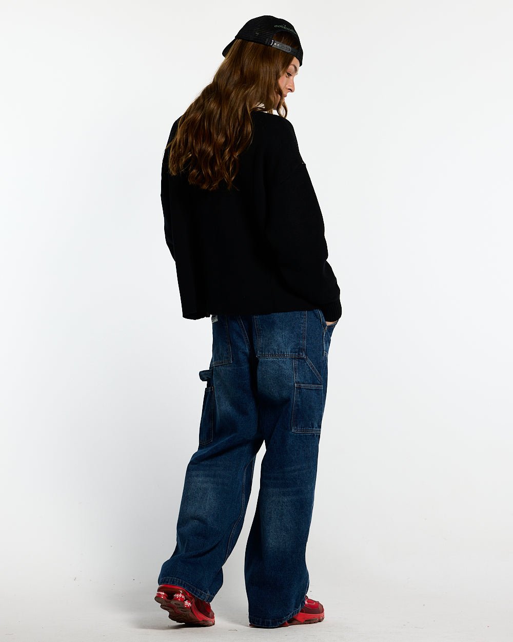 SPIDER KNIT BLACK - black spider print knit sweater, back view on female model - Cold Culture #woman