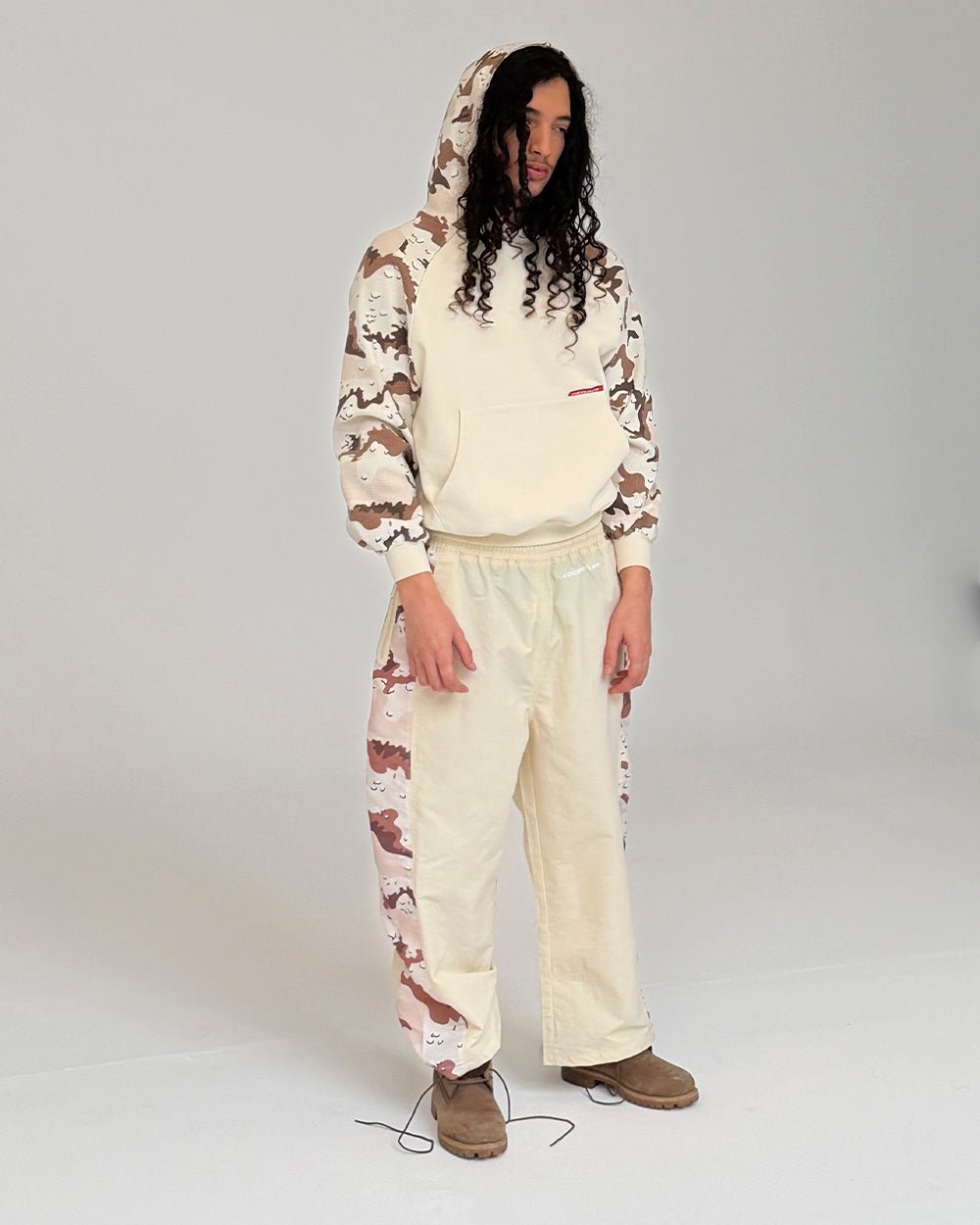 SPIDER PANTS BEIGE & CAMO - beige camo panel sweatpants, front view on male model - Cold Culture #man