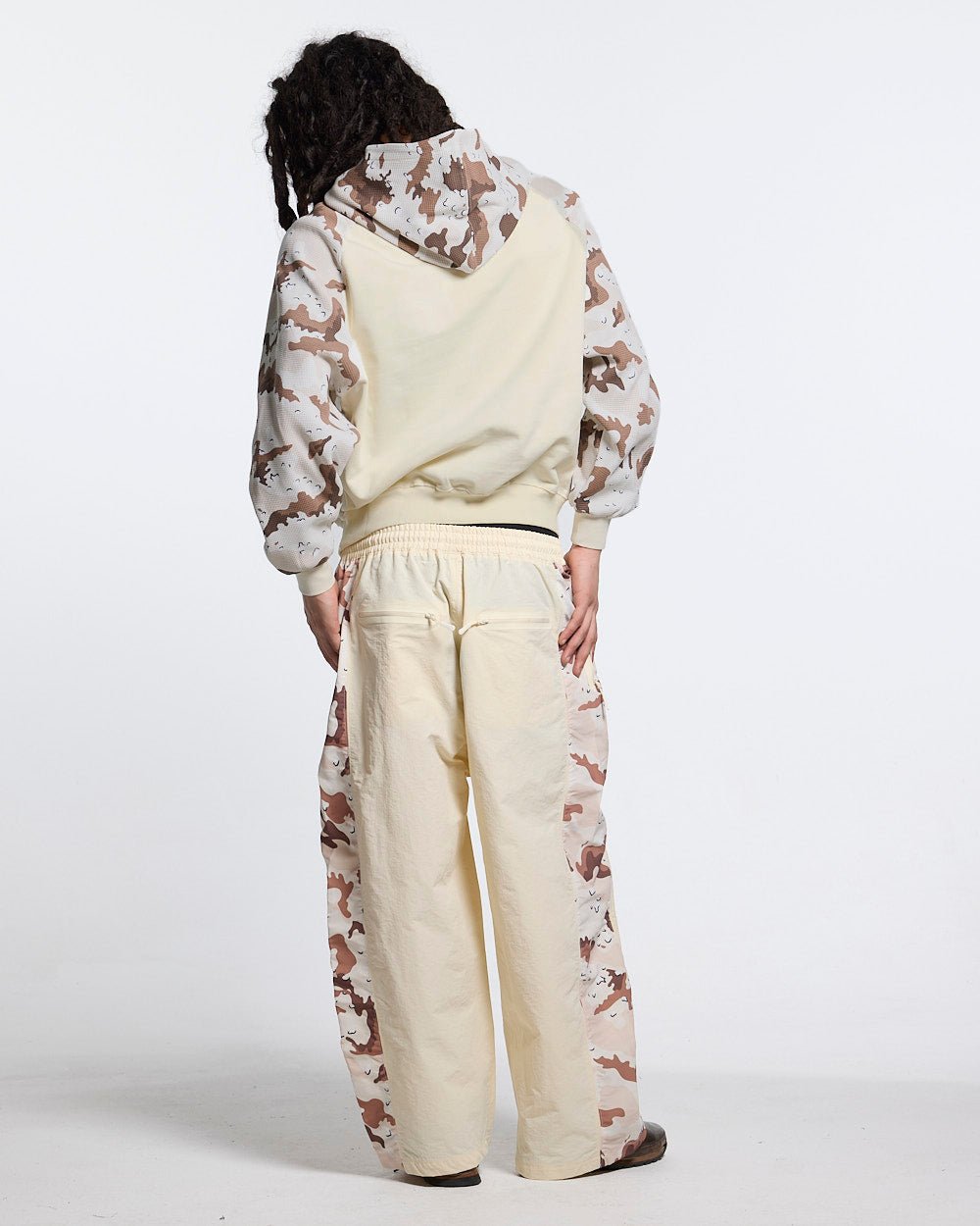 SPIDER PANTS BEIGE & CAMO - beige camo panel sweatpants, back view on male model - Cold Culture