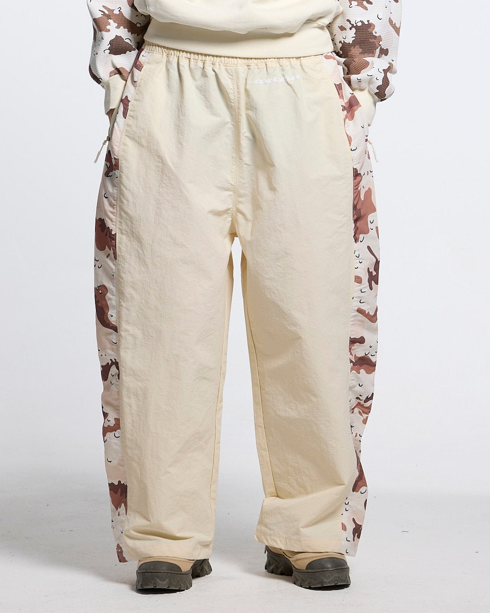 SPIDER PANTS BEIGE & CAMO - beige camo panel sweatpants, front view on male model - Cold Culture